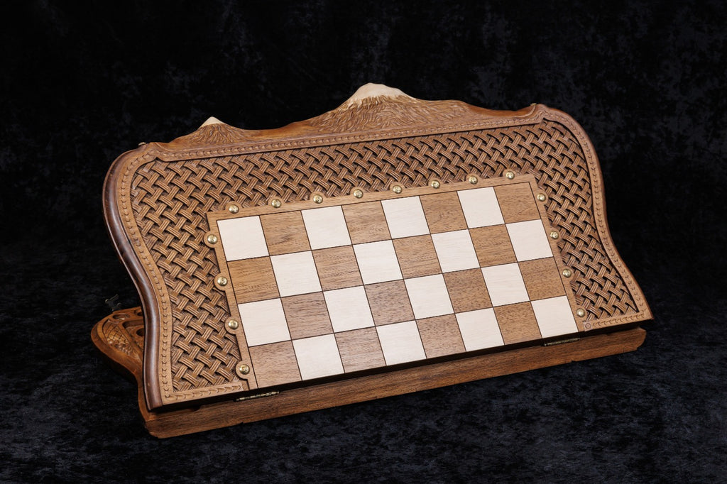 Chess and backgammon set closed, front view of the hornbeam chessboard in the carved braid frame