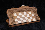 Chess and backgammon set closed, front view of the hornbeam chessboard in the carved braid frame