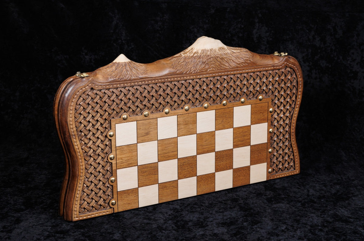 Chess and backgammon set closed, angled view of the carved braid frame and live edge