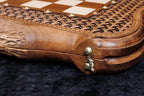 Close-up of the basket-weave braid carved in relief with bronze studs and the cast-bronze clasp