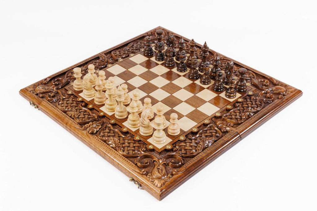 Luxury wooden chess set in solid walnut with open lattice braid border and hand-sculpted floral carvings — by Hrachya Ohanyan