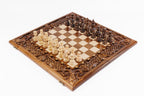 Luxury wooden chess set in solid walnut with open lattice braid border and hand-sculpted floral carvings — by Hrachya Ohanyan