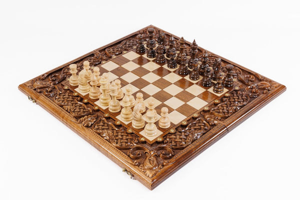Luxury wooden chess set in solid walnut with open lattice braid border and hand-sculpted floral carvings — by Hrachya Ohanyan
