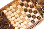 Pomegranate backgammon board - playing pieces and dice arranged on the board