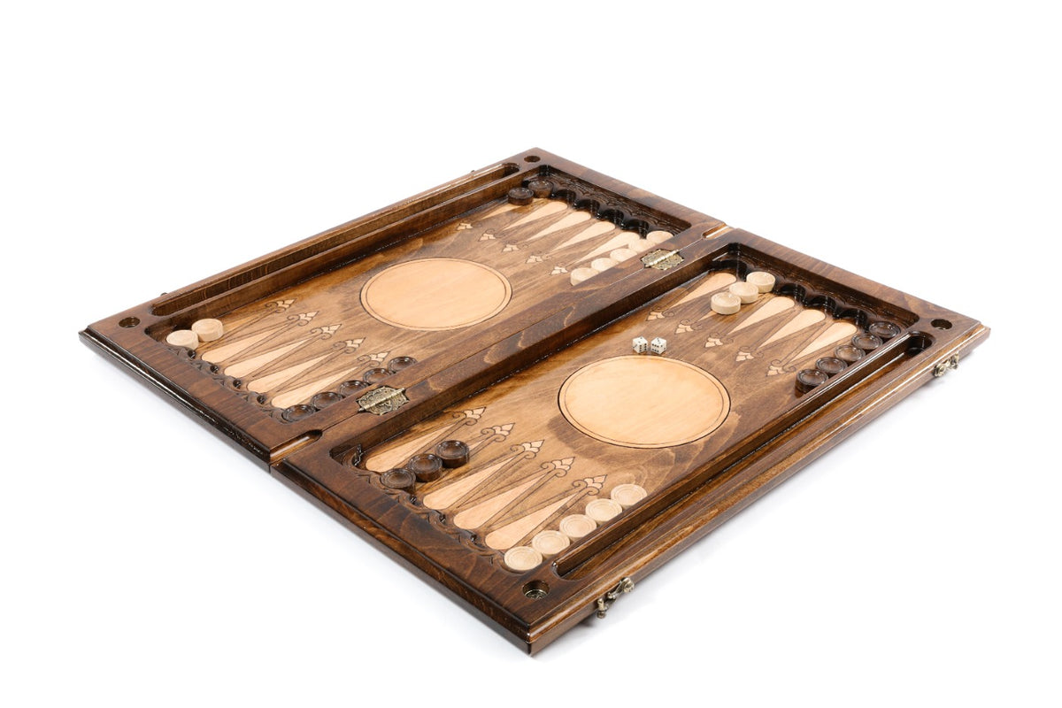 Chess and backgammon set opened to the plain backgammon field with carved points and checkers