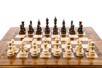 Front view of the classic chess set with all 32 hand-carved pieces and carved coordinates on the border