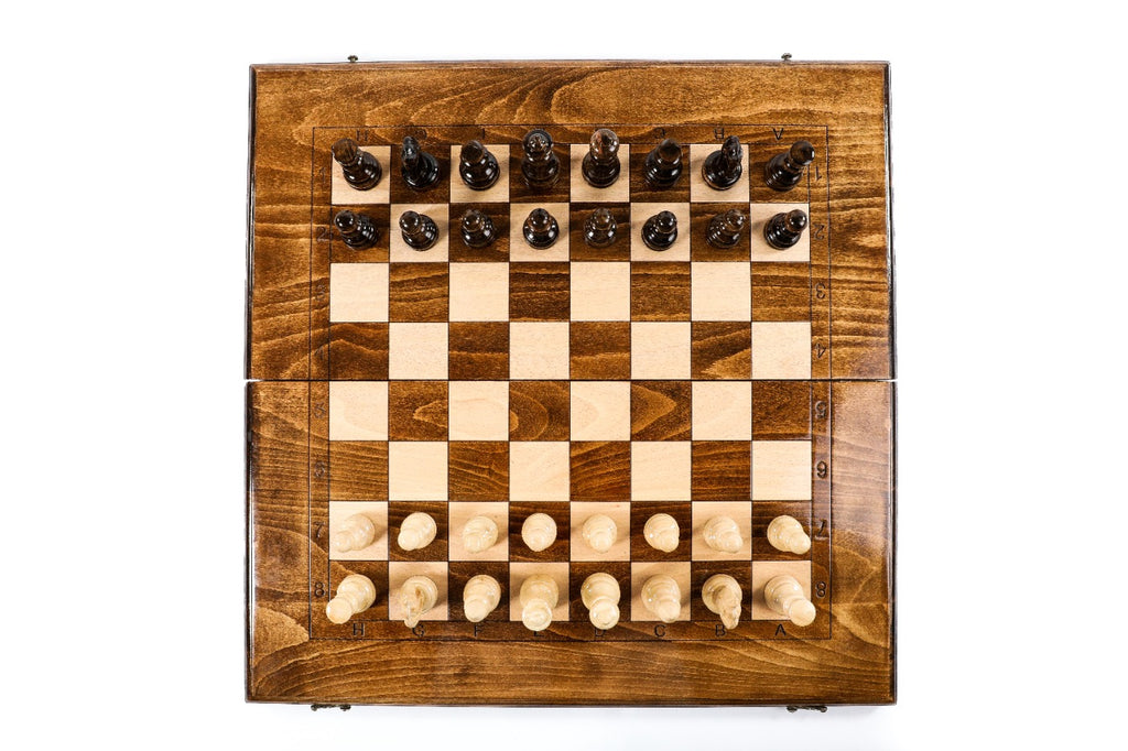 Top-down view of the plain classic chess set with pieces in starting position
