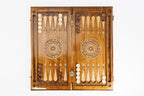 Ornamental Two Sided backgammon board - playing pieces and dice arranged on the board