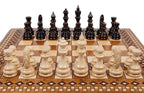Armenian Carpet chess and backgammon set - close-up of hand-carved chess pieces