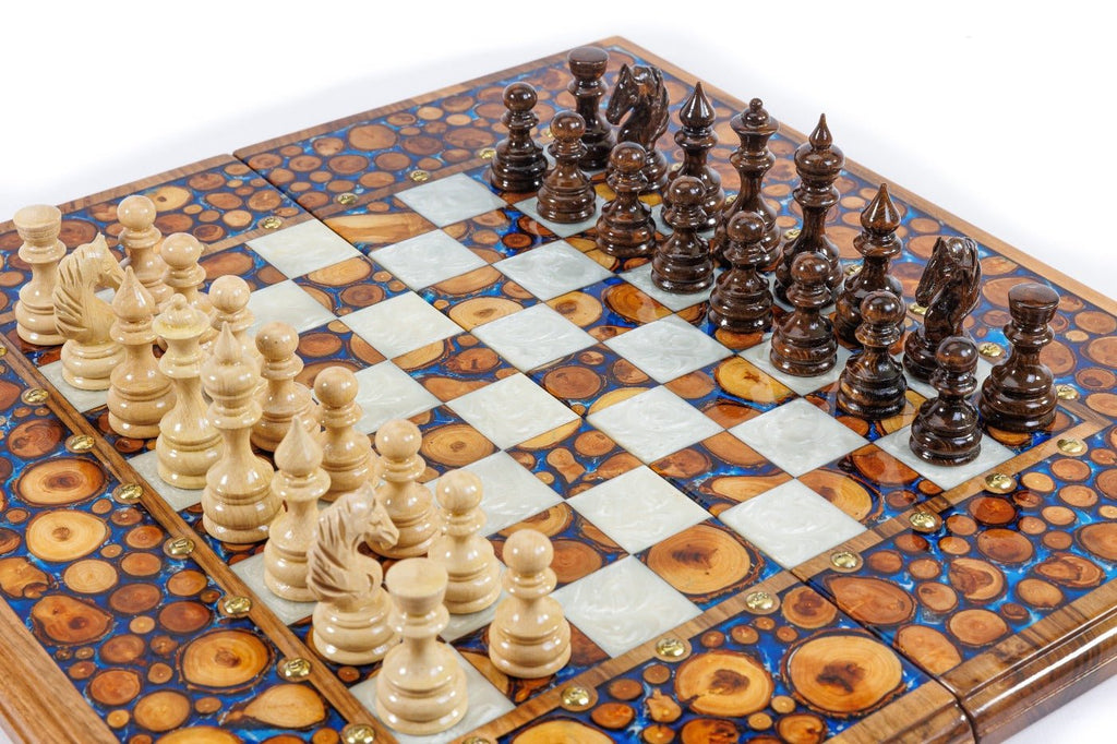 Handcrafted luxury walnut chess board with tree branch cross-section slices and blue epoxy resin inlay — 2-in-1 set