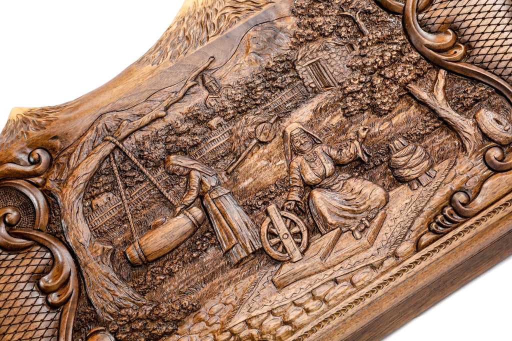 Frontal view of the pastoral landscape and hand-carved mountain silhouette on the solid wood exterior.