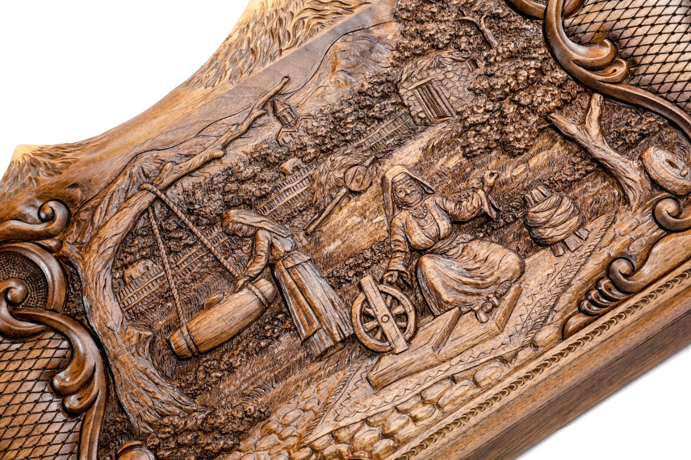Frontal view of the pastoral landscape and hand-carved mountain silhouette on the solid wood exterior.
