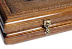Carved chess and backgammon set - close-up of hand-carved chess pieces