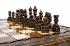 Carved chess and backgammon set - angled view showing the craftsmanship