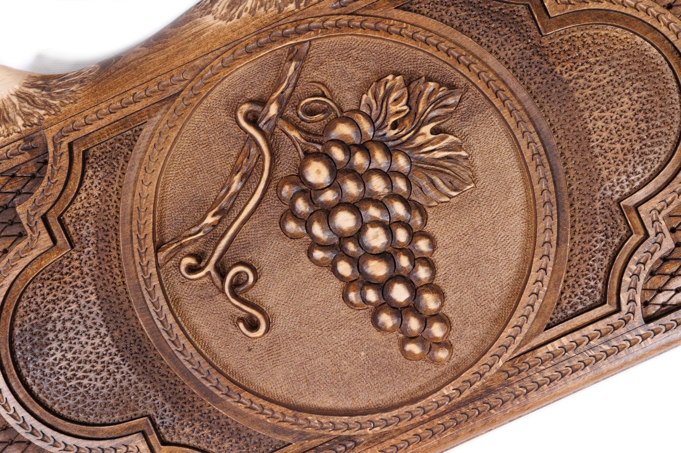 The interior view of the open Hrachya Ohanyan grapes set highlighting the rich wood grain and professional-grade playing surface.