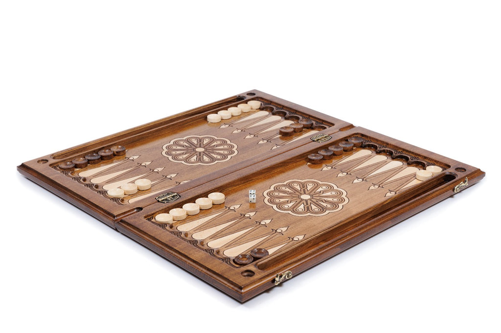 Armenian backgammon set open with pale and dark checkers and dice on the 60 cm board, angled view
