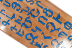 View of the 11672-style classic frame with epoxy-filled alphabet details.