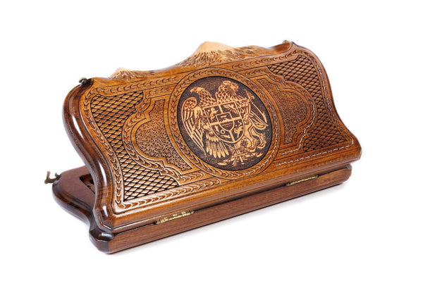 A frontal shot of the closed Armenian Coat of Arms backgammon board featuring high-relief carving within the copyrighted Mount Ararat outline.
