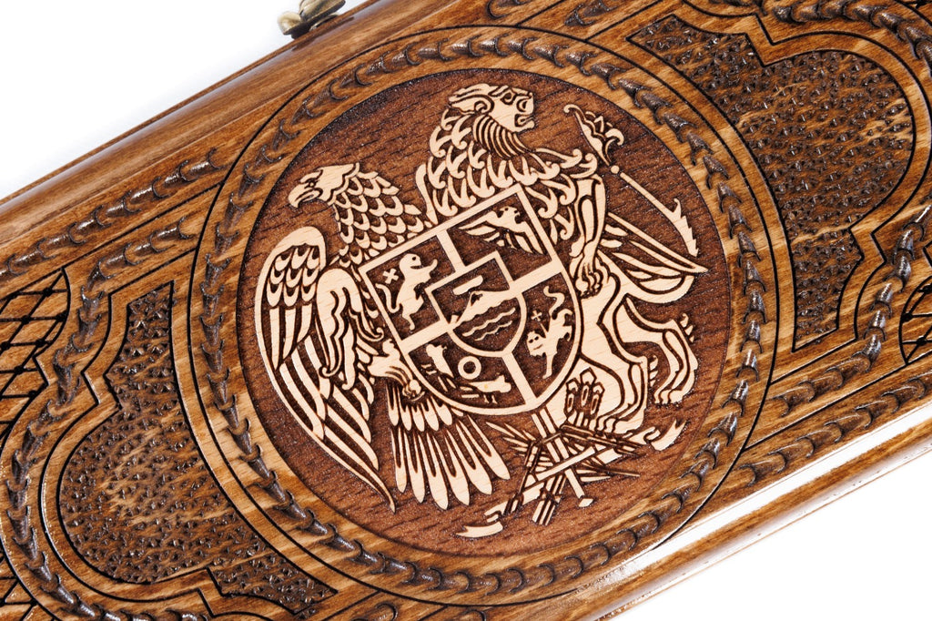 The interior view of the open Hrachya Ohanyan Armenian set highlighting the smooth wood finish and professional pips.
