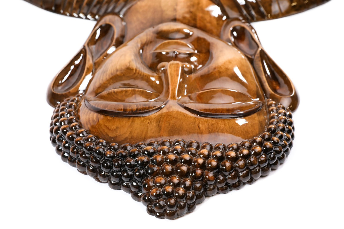 Wooden Buddha sculpture, natural grain detail
