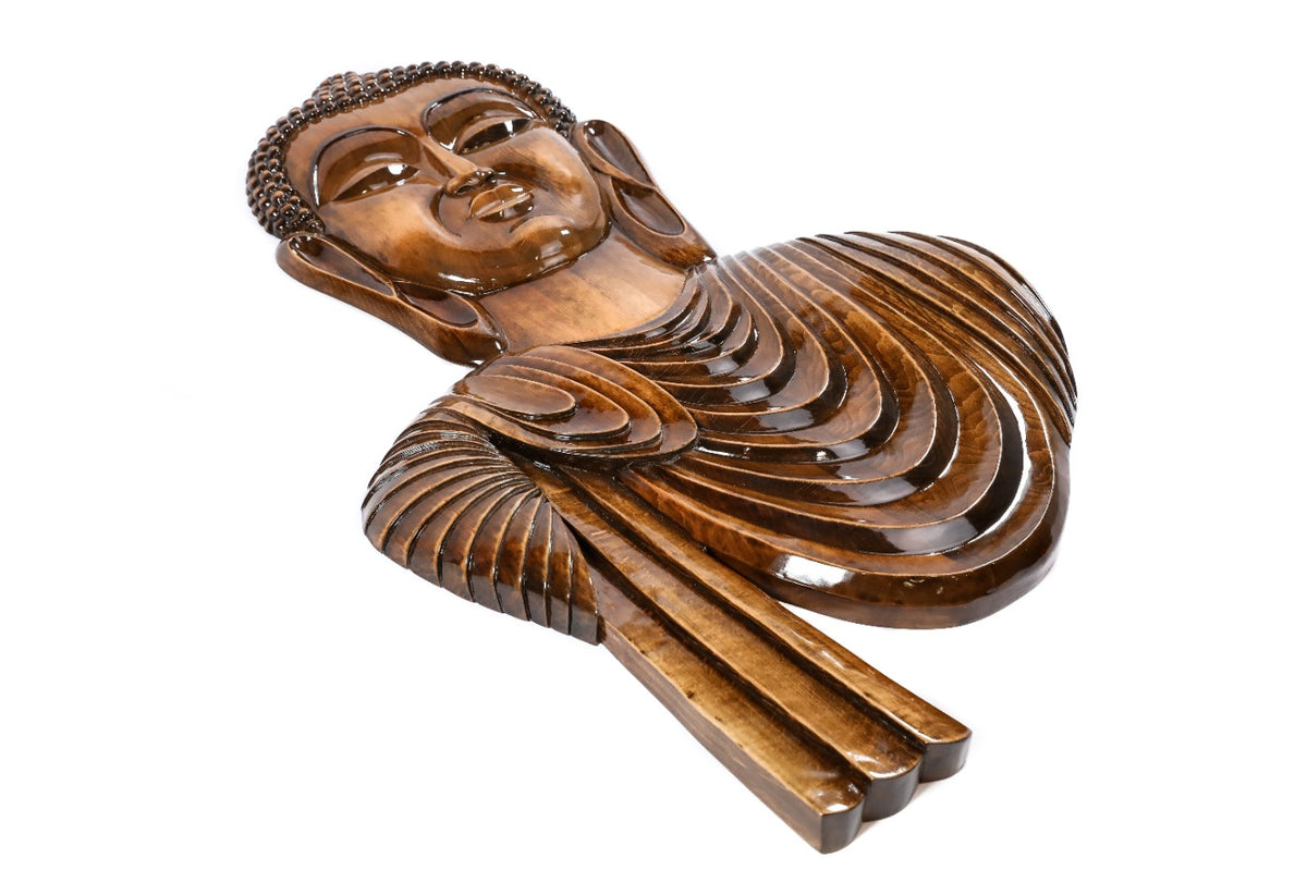 Wooden Buddha sculpture — close-up