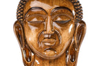 Hand-carved wooden Buddha sculpture on display