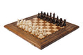 Wooden chess set with stippled border, scalloped inner frame and brass accents in warm beech wood — by Hrachya Ohanyan