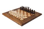 Wooden chess set with stippled border, scalloped inner frame and brass accents in warm beech wood — by Hrachya Ohanyan