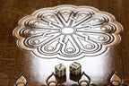 Carved Rococo backgammon set - close-up of the playing surface