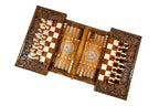 Backgammon checkers and dice on the wooden board