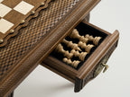 Handmade wooden chess table with carved pieces ready for play