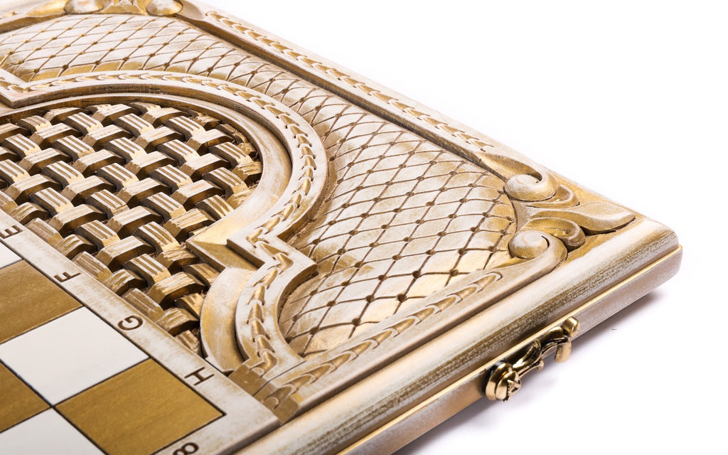 Basket-weave cartouche and lattice corner next to the gold chequerboard on the back cover