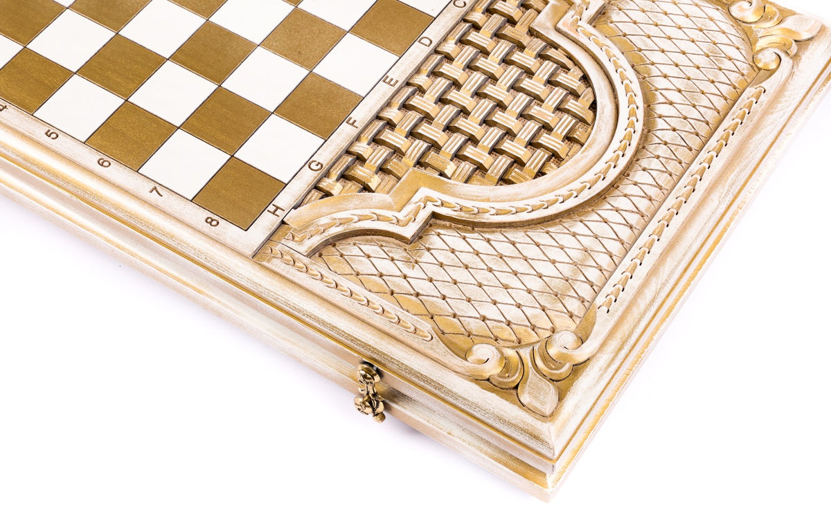 Gold-and-white chequerboard with the basket-weave cartouche and bronze clasp, angled view