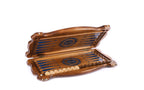 Walnut backgammon set open with blue epoxy points, checkers and dice on the 60 cm board, angled view