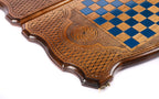 Corner of the back cover: blue epoxy chequerboard, eternity whirl and lattice on the contour edge