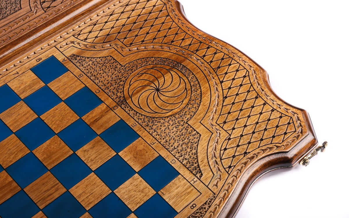Blue epoxy chequerboard and eternity whirl cartouche on the back cover, angled view