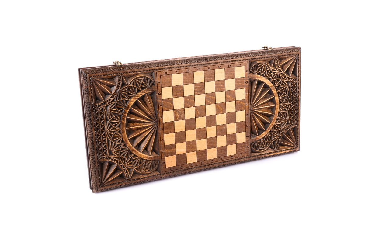Back cover of the chip-carved backgammon set: chequerboard between two carved fans