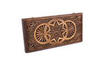 Chip-carved star backgammon set closed, front view of the faceted lid