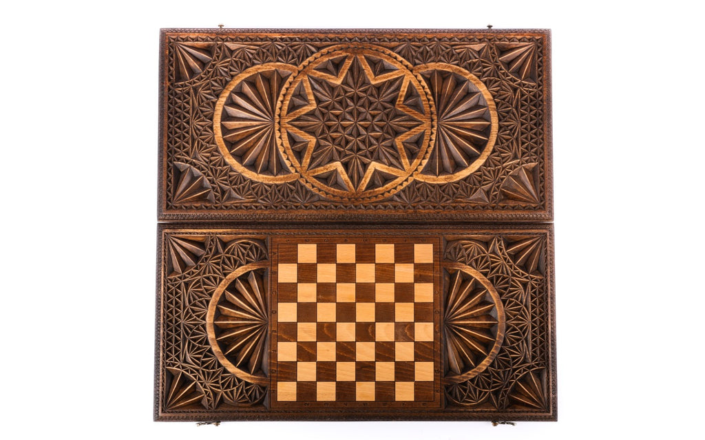 Front cover with the rings and star above the back cover with the chequerboard, seen from above