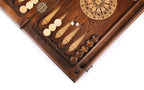 Checkers and dice on the open board beside the star-lattice rosette, hinge on the bar