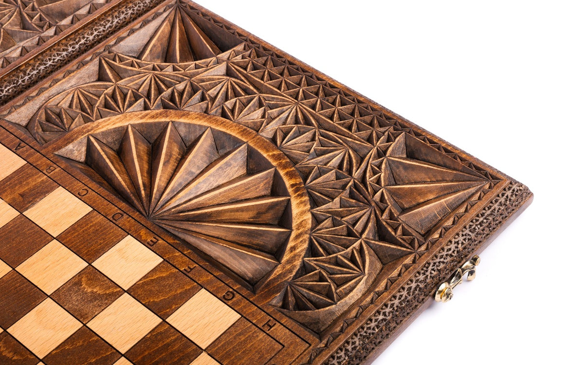 Chip-carved fan and facets beside the pale and dark squares of the chequerboard