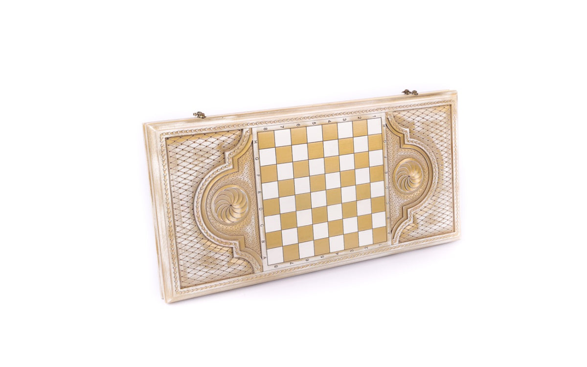 Back cover of the white and gold backgammon set: gold-and-white chequerboard inside the lattice cartouche