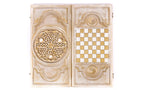 Front cover with the pomegranate panel above the back cover with the gold chequerboard, from above