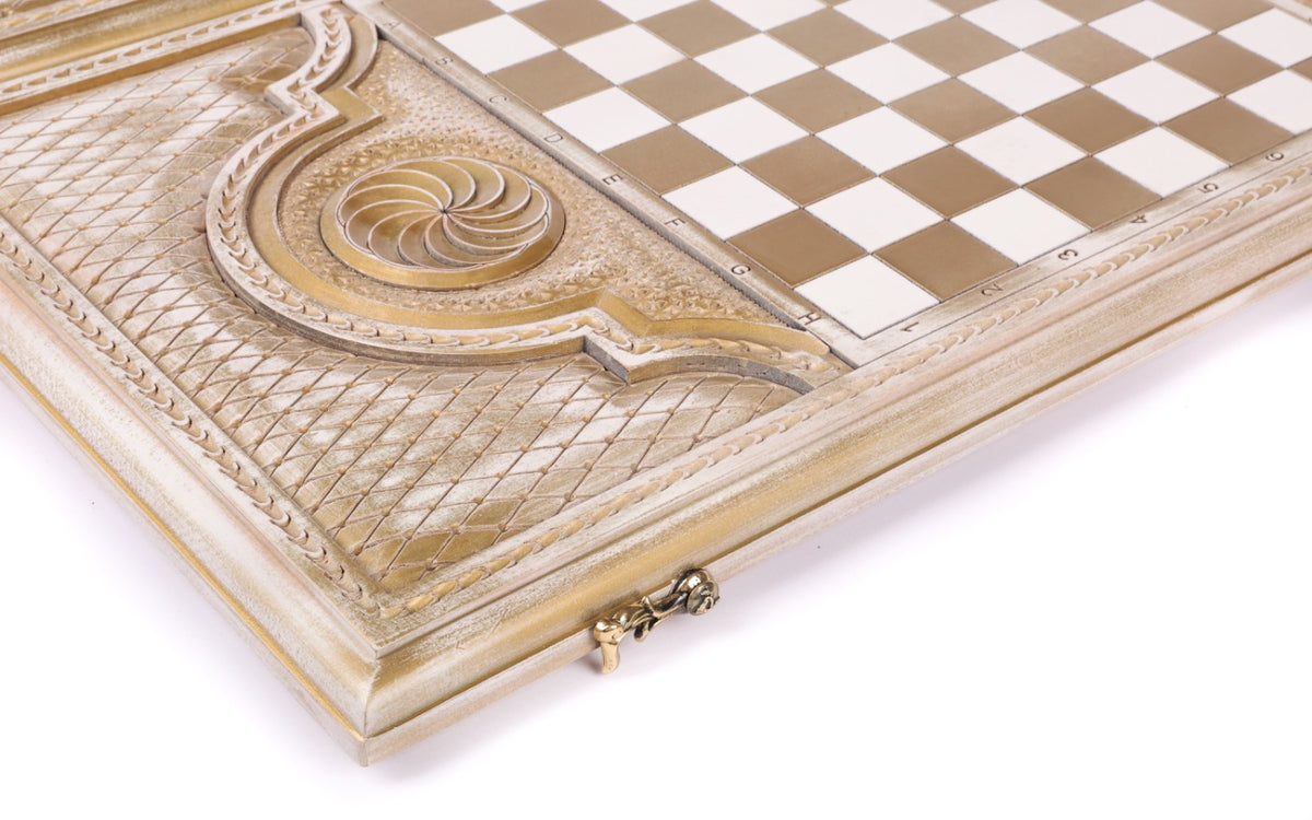 Eternity whirl in the lobed cartouche beside the gold chequerboard, lattice and rope border