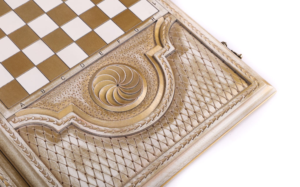 Gold chequerboard on the back cover with the eternity whirl cartouche and bronze clasp