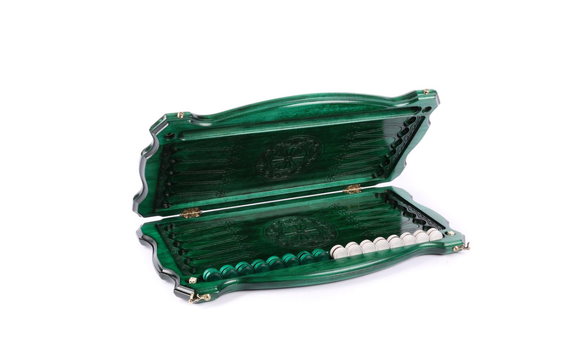 Green backgammon board opened flat, points drawn in line and a wheel ornament on each half