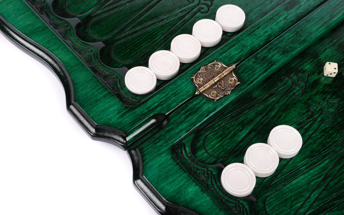 Cast-bronze hinge on the centre bar of the open green board with white checkers and dice