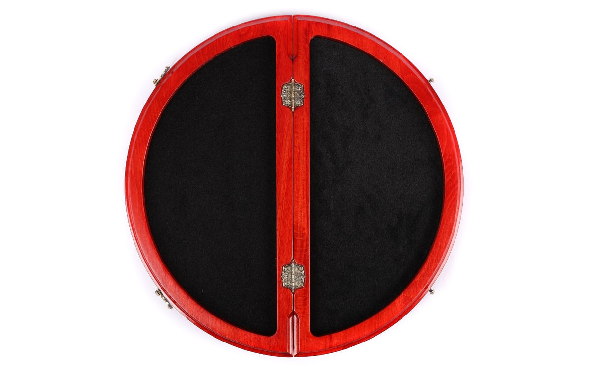 Round chess board opened flat to the empty black velvet compartment with bronze hinges