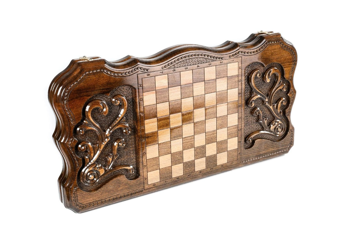 Back cover of the rococo backgammon set: chequerboard between two carved scroll panels