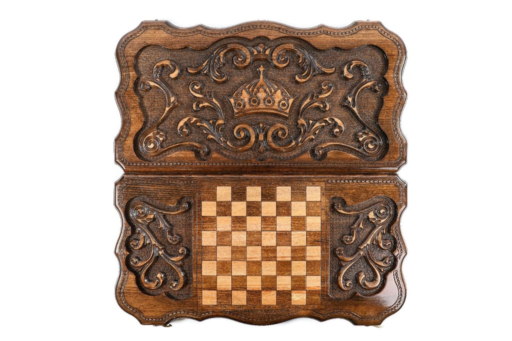 Front cover with the crown and scrolls above the back cover with the chequerboard, seen from above